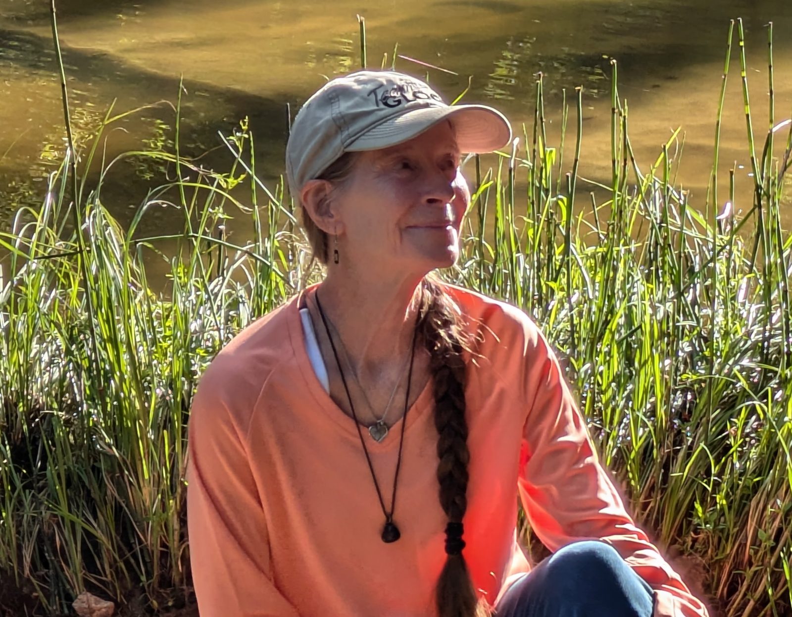 Karen Gant beside the water at Rock Bridge State Park